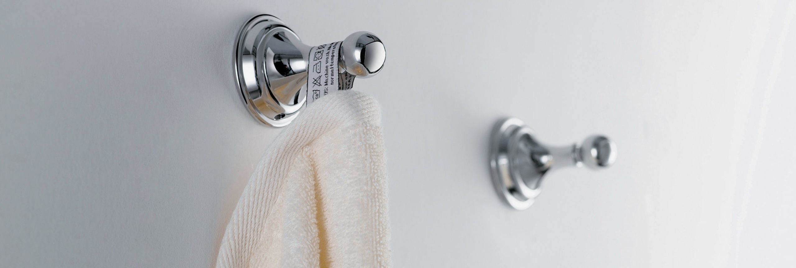 bathroom accessories: robe hooks on wall